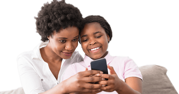 Reach Mobile - A happy mother daughter duo look at their monthly phone bill savings