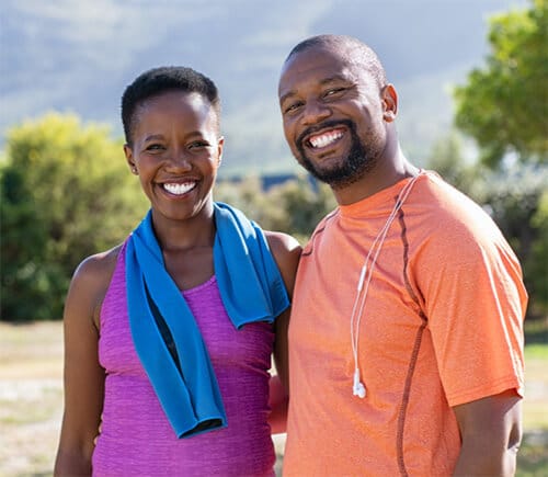 Reach Mobile - A happy couple who have saved $300 a year on their shared plan.